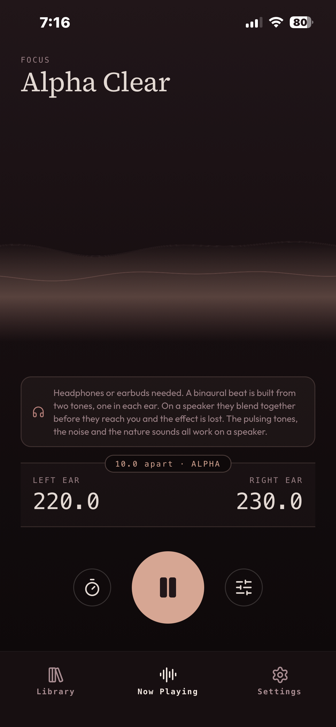 The Beatline Now Playing screen. A soundscape called Alpha Clear, with 220.0 hertz in the left ear, 230.0 in the right and 10.0 apart between them, above a notice explaining that headphones or earbuds are needed for a binaural beat.